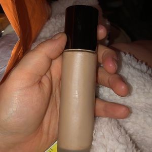 Becca aqua luminous foundation in the shade Fair